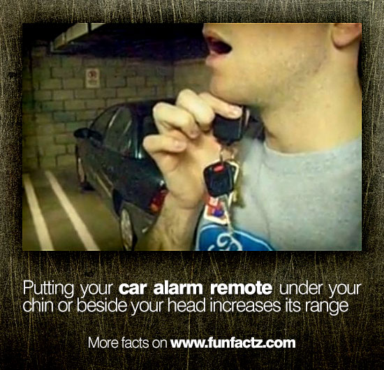 Putting your car alarm remote under your chin or beside your head