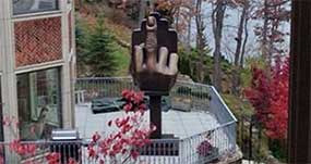 Man Bought House Next to Ex-Wife and Installed Giant Middle Finger